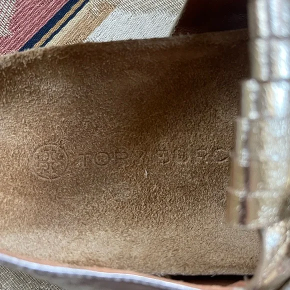 Tory Burch Multi-Logo Kiltie Sandal - Silver / Spark Gold / Natural. Size 7